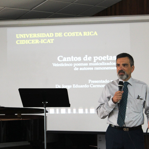 Presentación de Dr. Jorge Eduardo Carmona sobre “Cantos de poetas: Veinticinco poemas musicalizado de autores ramonenses”.